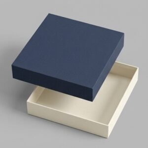 Navy blue textured lid hovering over a cream colored base of White Rigid Boxes custom packaging